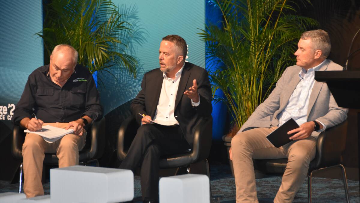 Dr Tim Ault (centre) speaking at the 2024 Wagyu Edge conference. With him is analyst Simon Quilty and AACo's David Harris. Picture Shan Goodwin.