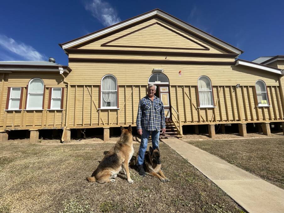 Earl Robinson with Zena and Zac outside the old School of Mines in Charters Towers. Picture by Steph Allen.