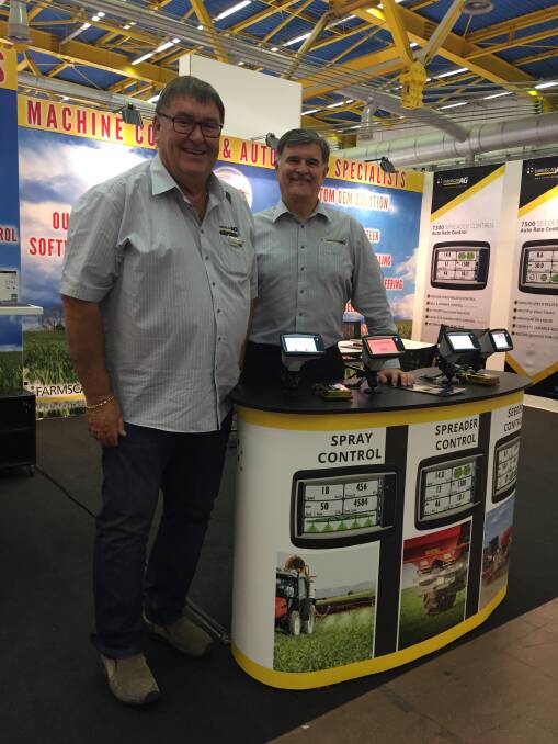 Farmscan Ag directors, Ian Giles (L) and John Chalmers working on the company's international expansion at the recent EIMA 2016 trade fair in Italy.