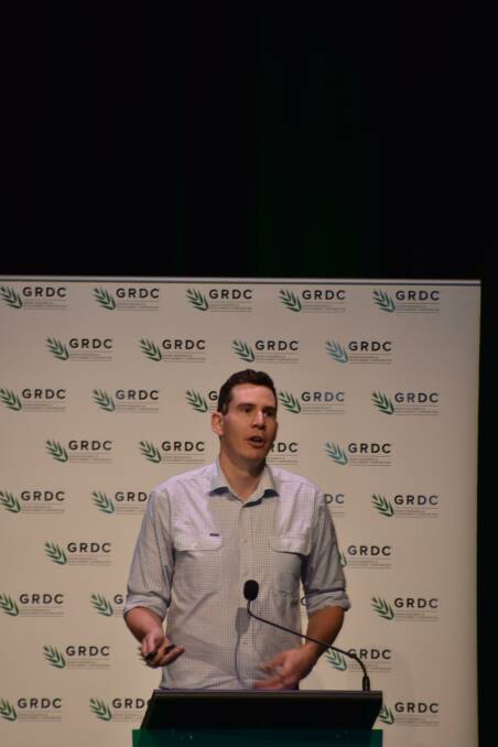 Tim Green explains the merits of short season wheat lines at the GRDC update in Bendigo. Photo by Gregor Heard.