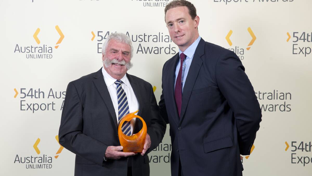 AGRIBUSINESS AWARD: Commonwealth Bank general manager regional & agribusiness banking, Adrian Parker, congratulates Australian Honey Products managing director, Lindsay Bourke, on winning the Agribusiness Award. Picture: Eddie Safarik Images.