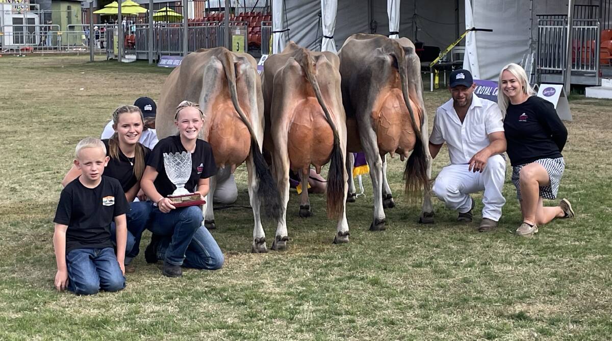 Todd and Sarah Wilson with their children Koby, Ella and Marlie with their 8th winning team of three Jersey cows at the Sydney Royal interbreed competition.