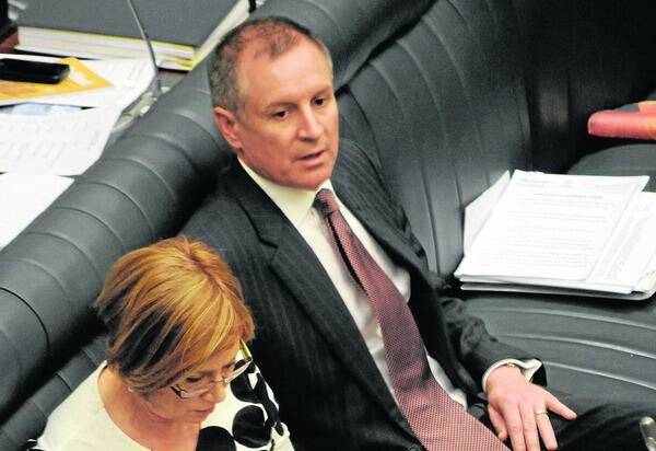 IN WAITING: Incoming Premier Jay Weatherill, pictured here in the House of Assembly with Minister for Families and Communities Jennifer Rankine, says he will visit regional communities soon after starting his new role.